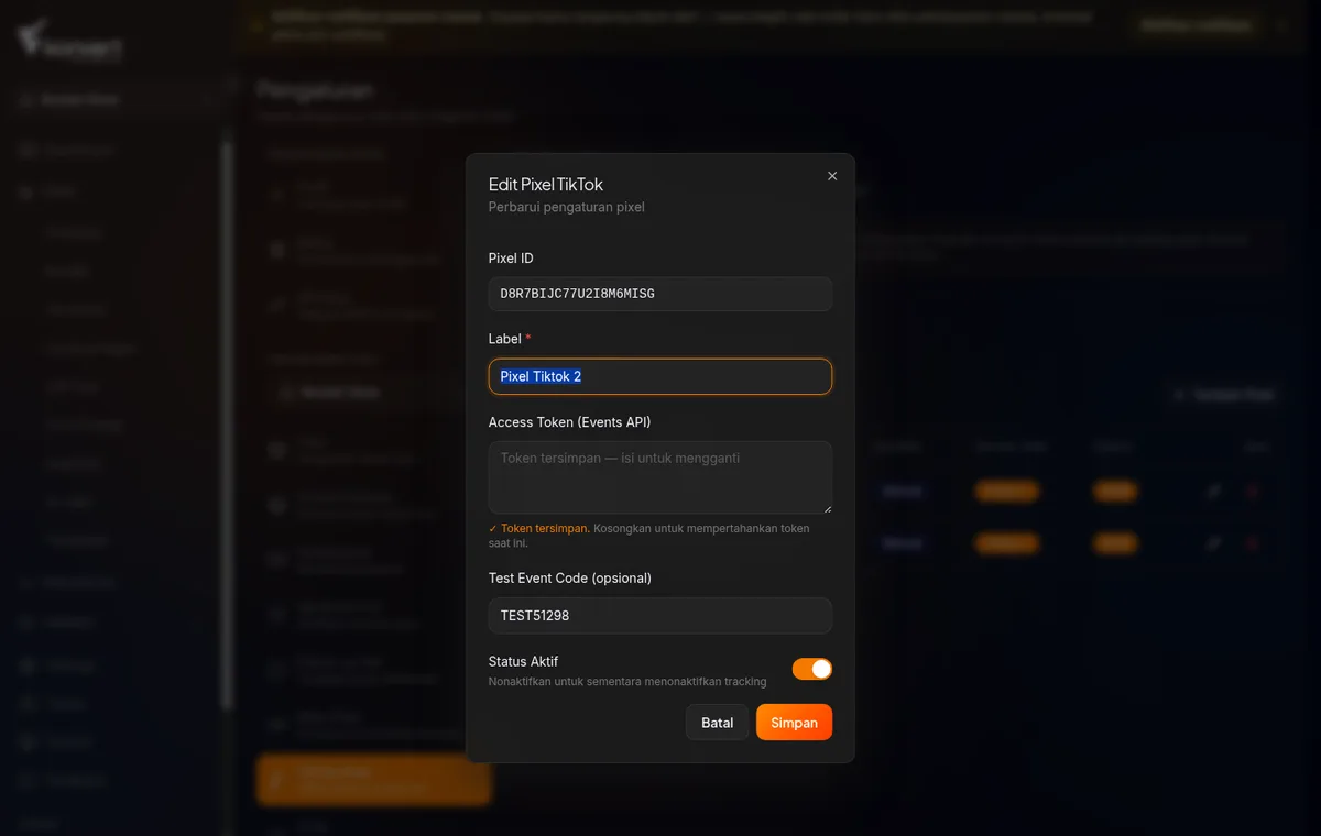 dialog "Edit Pixel TikTok" di /settings/tiktok — toggle Status Aktif dan field Access Token dengan placeholder "Token tersimpan — isi untuk mengganti"